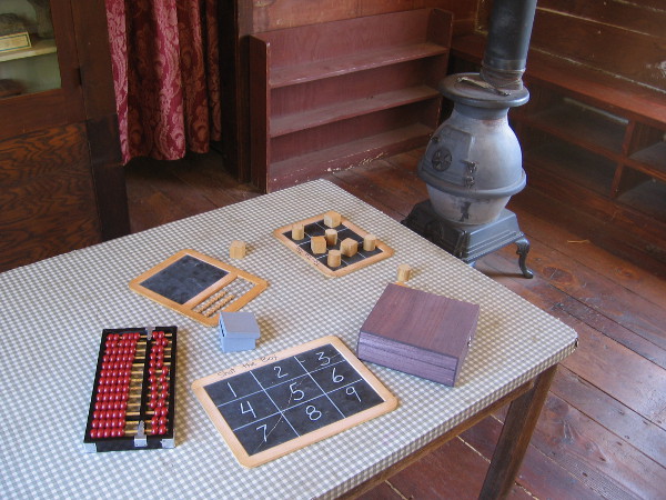 Children attending the Mason Street School used slates and chalk, as paper was also scarce and expensive. A wood stove provided heat.