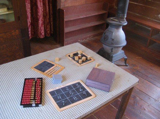 Children attending the Mason Street School used slates and chalk, as paper was also scarce and expensive. A wood stove provided heat.