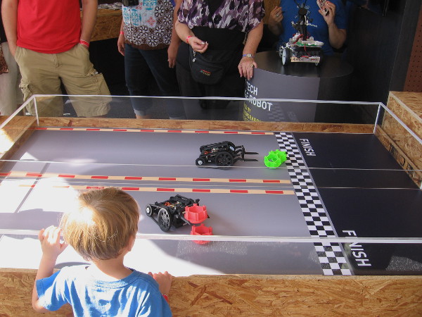 Another fun part of the Qualcomm exhibit at Maker Faire. Robots stack blocks, then cross a finish line.