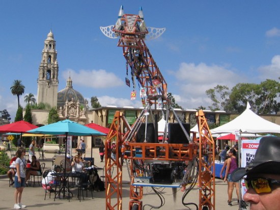 Back down El Prado, and now the Electric Giraffe is on the move! This creation has been featured on national media, and even was tickled by President Obama.