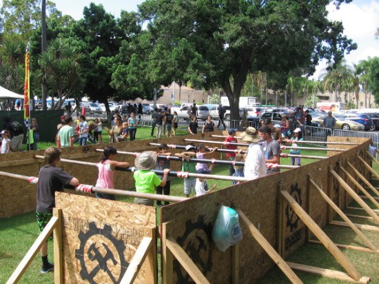 These kids are playing human foosball by the Hall of Champions!