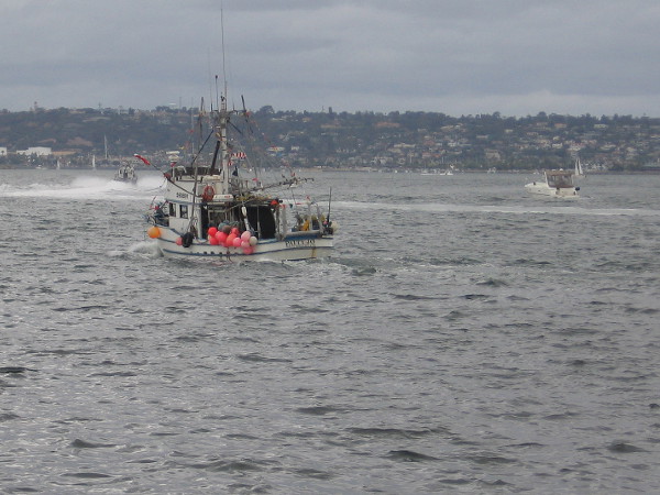 The Patty Jo now confidently heads off across the gray water, hoping for safe ocean journeys and bountiful catches.