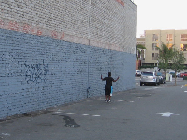A boy jumps rope on one October morning in a downtown San Diego parking lot.