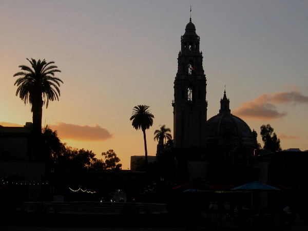 Glowing orange clouds at day's end, and the California Tower in silhouette. Photo taken from Plaza de Panama in San Diego's Balboa Park.