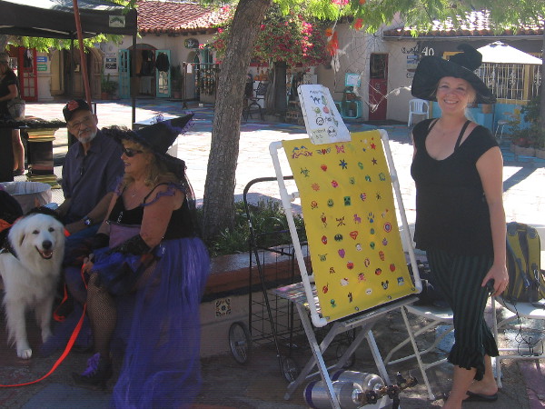 This witch assured me she was a nice witch. Not one of those wicked ones. But I don't know about all those spooky symbols on the sign beside her.