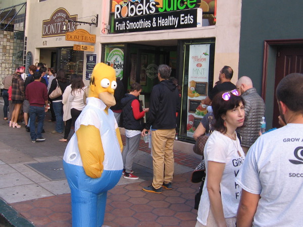 Homer Simpson was out greeting a long line of Donut Bar customers one Saturday morning!