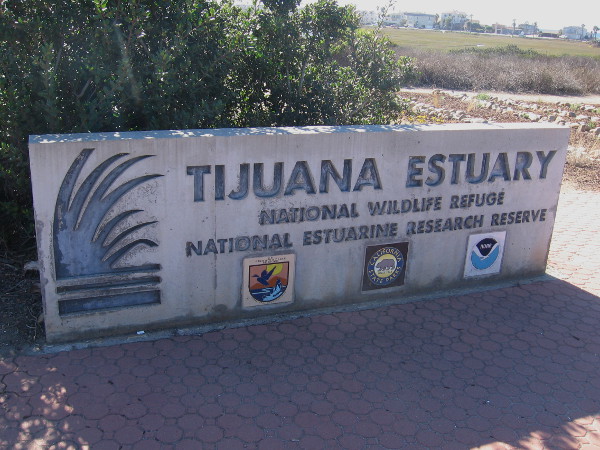 Sign near the entrance to Visitor Center of Tijuana Estuary, home of a National Wildlife Refuge and National Estuarine Research Reserve.