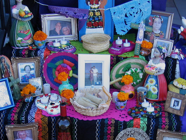 A traditional Dia de los Muertos altar in Sherman Heights summons ancestors and close loved ones who have passed from this world.