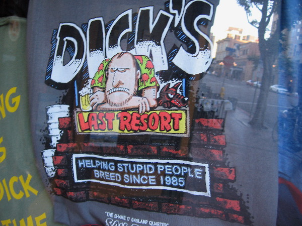 Funny shirt in restaurant window reads Dick's Last Resort...Helping Stupid People Breed Since 1985.