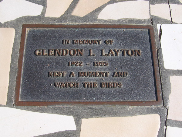 Plaque on another bench at the south end of the trail. In memory of Glendon I. Layton. Rest a moment and watch the birds.