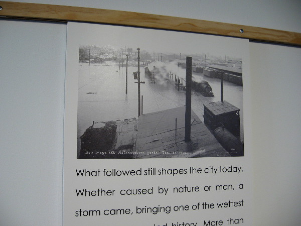 Photo at RAINMAKER exhibition shows catastrophic San Diego flooding caused by 30 inches of rain in 1915.
