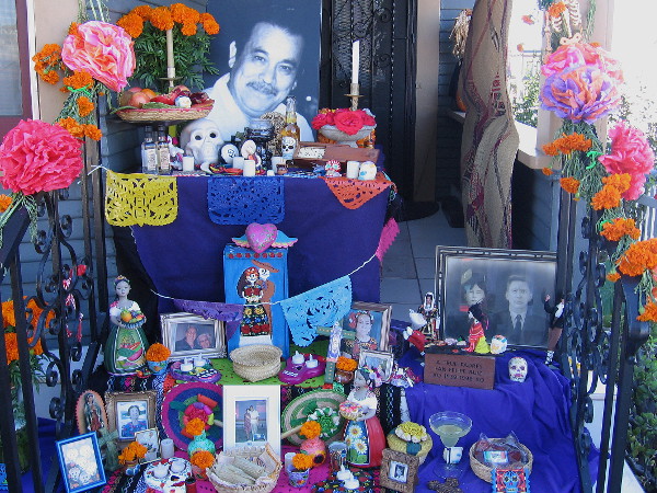 A beautiful outdoor Dia de los Muertos altar in Sherman Heights. An ordinary family cherishes extraordinary memories.