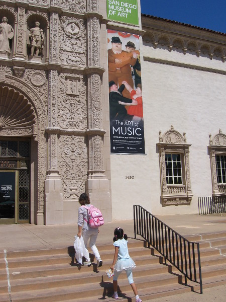 People head up steps from Balboa Park's Plaza de Panama to visit the wonderful San Diego Museum of Art.
