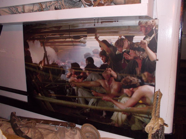 Artistic depiction of activity below deck during an engagement with the enemy. Operating the cannons was a complicated, dangerous duty.