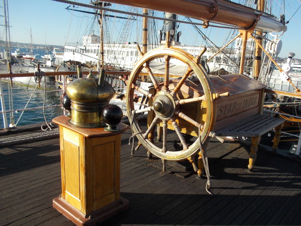 The Star of India's steering wheel and binnacle on the poop deck.