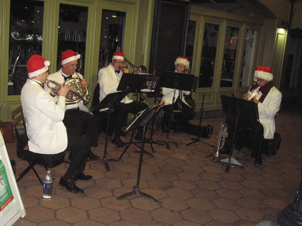 It's the Deck the Halls Brass Quintet performing holiday music! Good times were had by local residents and businesses on one block of B Street in San Diego's financial district.