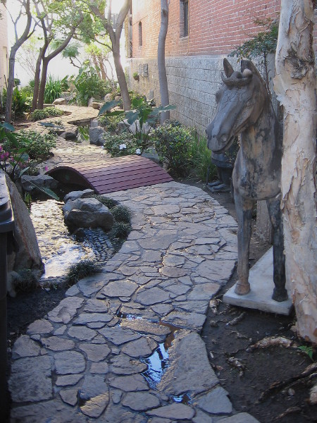 Looking through the Dr. Sun Yat-Sen Memorial Gate on Third Avenue. Behind the museum is a small Asian garden.
