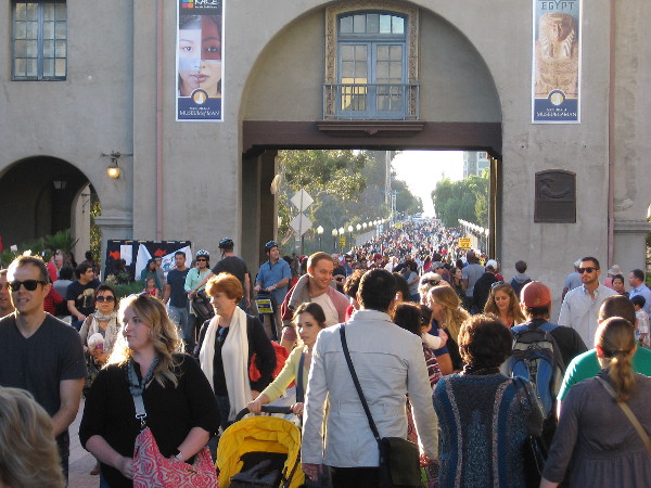 Tens of thousands stream into Balboa Park from across the Cabrillo Bridge. December Nights is one of the largest holiday festivals in the United States.