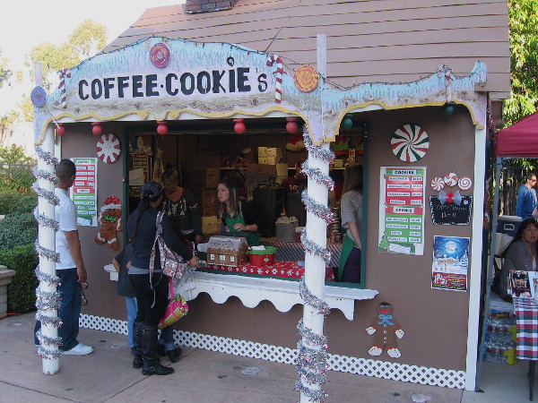 Folks are buying goodies at the cookie shack near the Spreckels Organ Pavilion during December Nights.