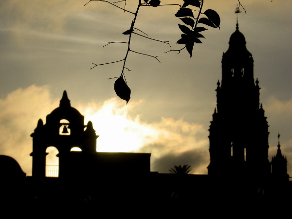 The House of Charm and California Tower in silhouette as day ends.