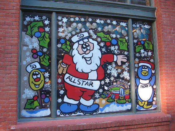 Just before Christmas, All-Star Santa has been painted on the window of the San Diego Padres Store in the Western Metal Supply Co. Building!
