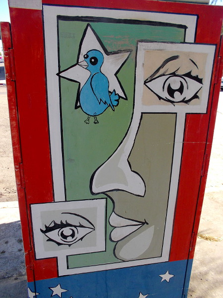 Another side of the creatively decorated utility box.