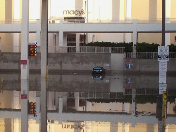 A couple dozen cars were spotted flooded at the Fashion Valley shopping mall. This one was stranded not far from Macy's, which also suffered some flooding inside the store.