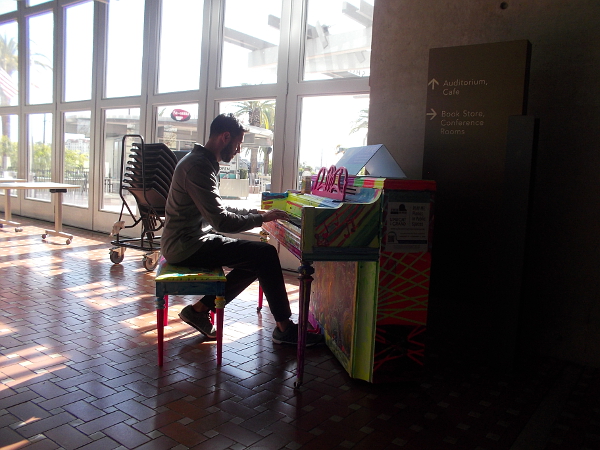 One of ten pianos placed around San Diego for the public to enjoy. Many library patrons coming through the front door were treated to unexpected music!