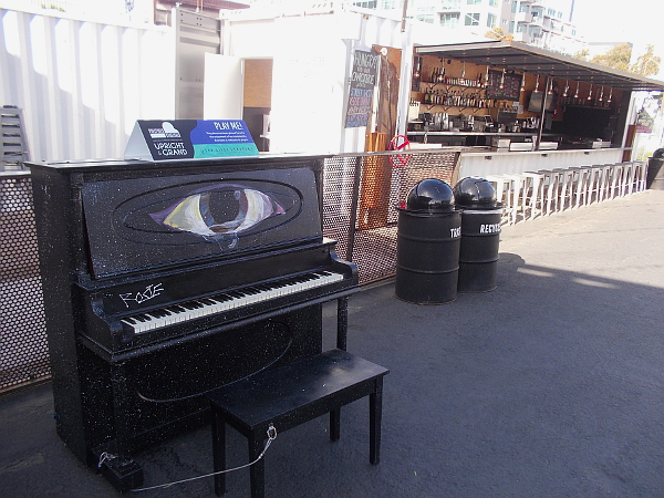 This piano has a big cyclops eye. It sits outside in the Quartyard in San Diego's East Village.