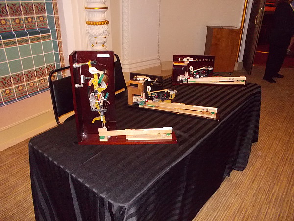 One table had samples of a piano key's inner workings. Later on I saw lots of families and kids examining these with interest.