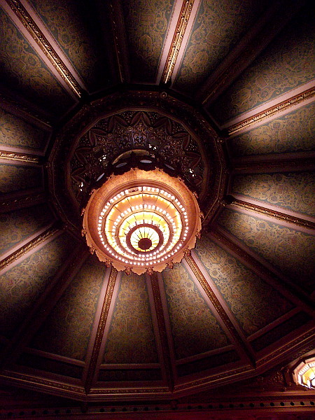 Looking up inside the concert hall. A friendly usher told me there's a winding staircase in the huge chandelier! Girls used to toss rose petals onto the audience, once upon a time long ago.