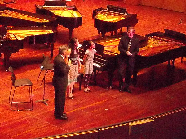 After the first hour's concert is over, the audience applauds narrator Dave Scott and amazing pianists Jessie Chang and Bryan Verhoye!