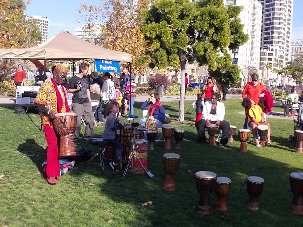 People were enjoying drumming on the grass in Ruocco Park, near Seaport Village.