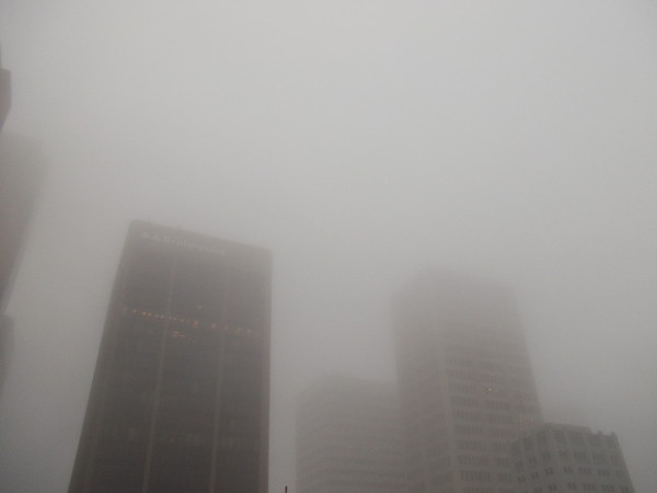 Skyscrapers aren't scraping so much this morning. They are being softly engulfed by the elements!