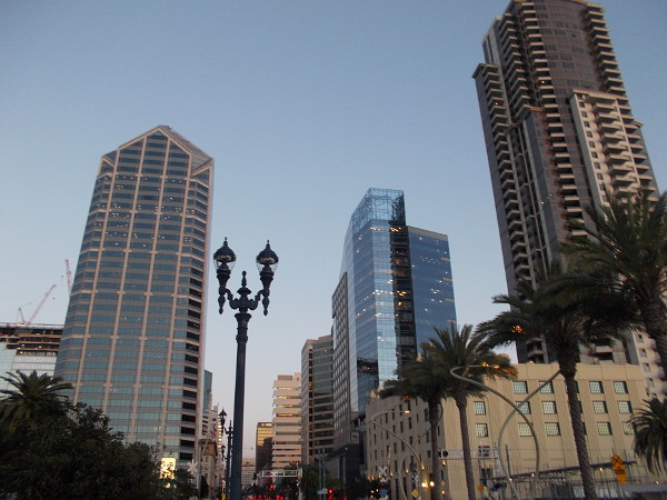 High buildings in downtown San Diego change color with every passing minute as my feet and twilight steadily progress.