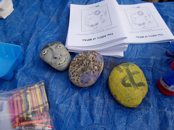 An art project for kids involved creatively decorating stones!