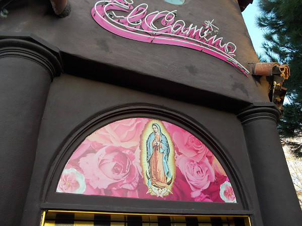 A radiant Madonna above the front door of El Camino, a crazy, kitschy Mexican eatery and bar in San Diego's Little Italy.