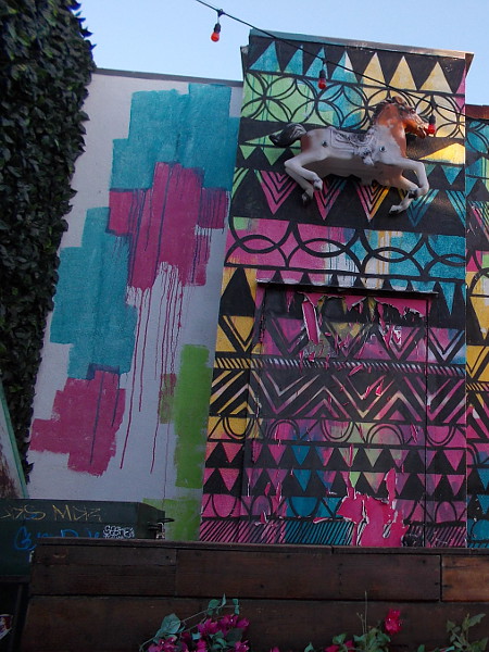 Colorful application of kitsch on the outside of El Camino.