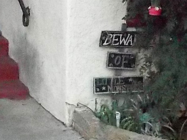 A sign warns: Beware of Little Monsters.