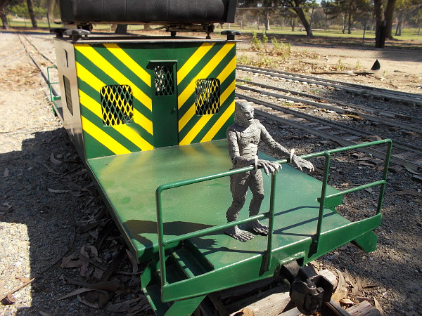 This caboose in the rail yard seems to be occupied by the Creature from the Black Lagoon!