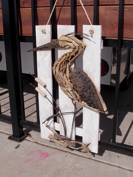 This cool artistic heron is part of the decor at the new outdoor cafe, tackle and bait shop.