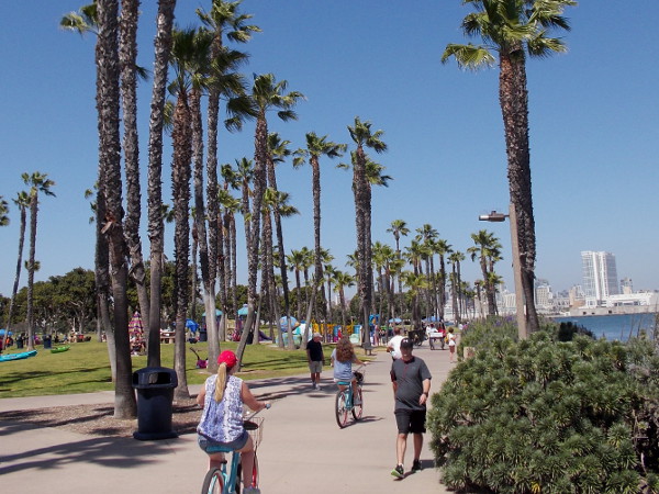 People walk and ride down the Bayshore Bikeway. Head the opposite way and you'd go under the Coronado Bridge, along Glorietta Boulevard and Coronado Golf Course, then finally south down the Silver Strand.