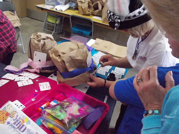 You can apply ribbons, glitter, feathers, playing cards, whatever you like to fashion your crazy Mad Hatter hat! Okay, I don't suppose this really is science, but who cares!