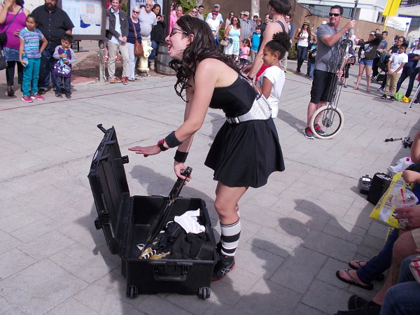 A wicked-looking knife getting readied at the Seaport Village Spring Busker Festival!