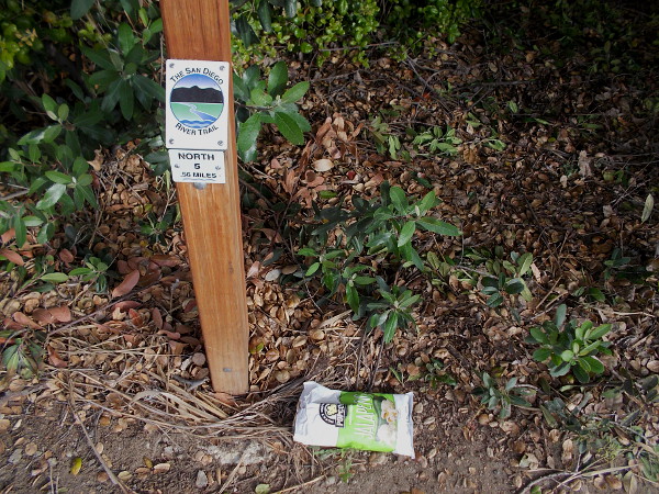 Litter carelessly dropped by a mile marker for The San Diego River Trail. It was picked up.