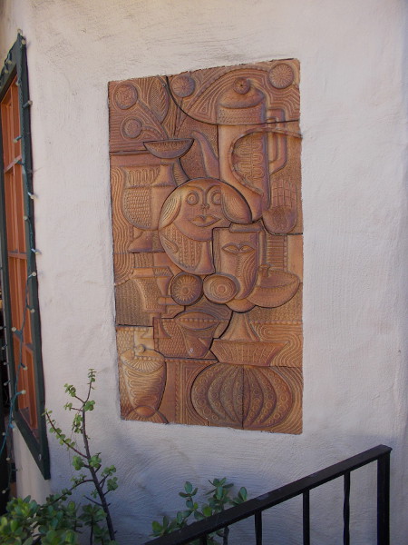 Near Studio 8's entrance are two amazing works of art. Here's one. It was created by John Novy, a potter who was a member of Spanish Village from 1969 to 1977.