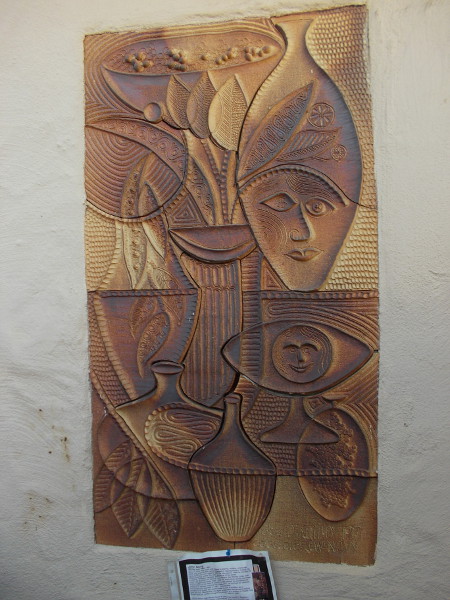 Second amazing installation of ceramic tiles on exterior of Studio 8 in Spanish Village. This art was created by professional potter John Novy.
