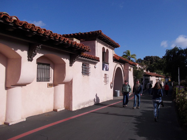 Walking along the west edge of Spanish Village. Many historic columns and arches provide this artist's co-op with unique character.