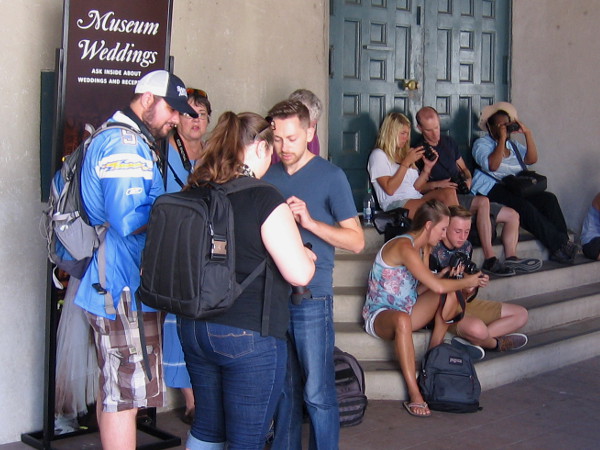 A photography class in world-famous Balboa Park. Students check out their cameras near the Museum of Man.