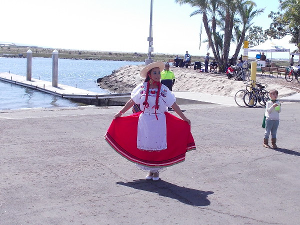 A cheerful dress on a beautiful day in San Diego's South Bay. A nearby boat ramp leads into the channel of the Sweetwater River.